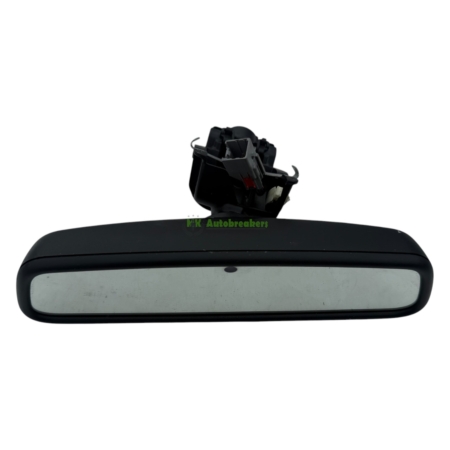 Rearview mirror with a black mounting unit attached to the top of the housing.