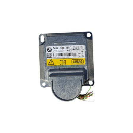 Airbag control unit (ACU) in a metal housing with a yellow warning label reading AIRBAG and multi-wire connector.
