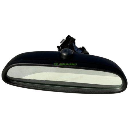Rearview mirror with a broken mount and shattered pieces on top, against a white background (car part image).