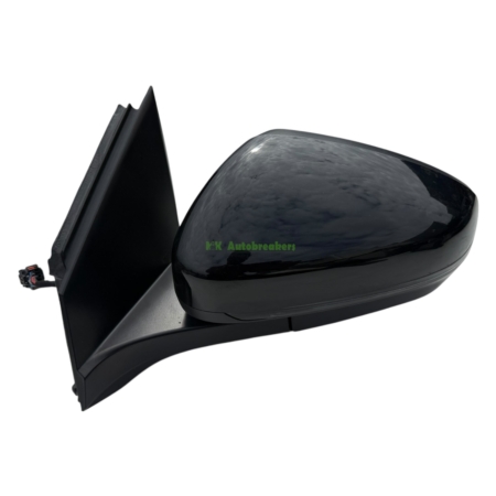 Close-up of a black glossy car side mirror with mounting base visible