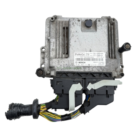 Automotive engine control unit (ECU) with metal housing, label reading FoMoCo/Bosch, and multi-colored wiring harness
