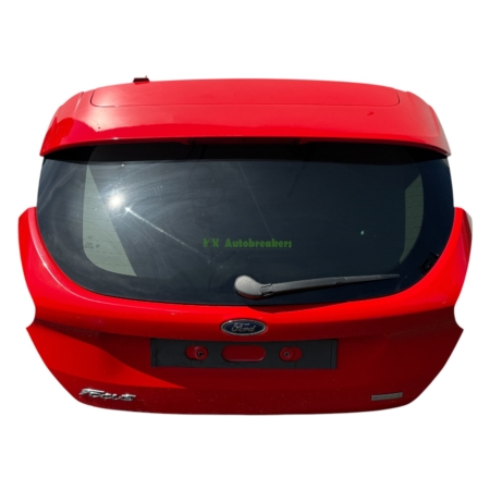 Top-down view of a red Ford car rear hatch with rear window, wiper, and the Ford emblem visible