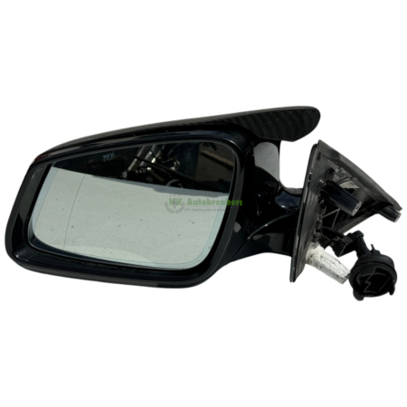 Car side-view mirror assembly in black with a carbon-fiber-like aerodynamic fin on top edge of the housing