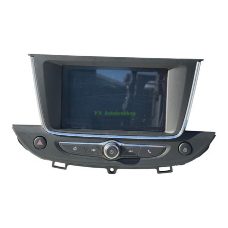 Car dashboard infotainment unit with a touchscreen display and hazard button nearby.