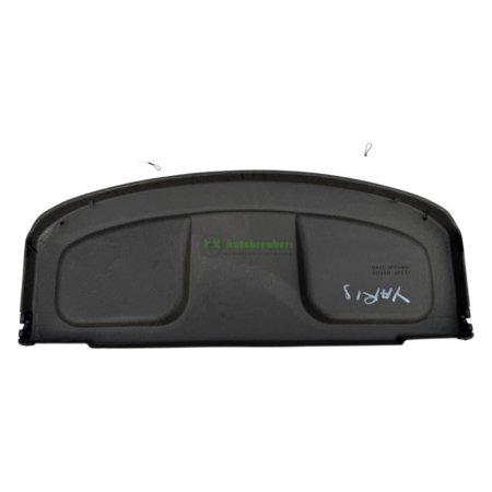 Black plastic rear hatch interior panel from a car, curved top edge with faint green branding.