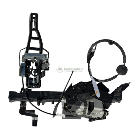 Disassembled automotive steering column with exposed gears, cables, and plastic housing on a white background.